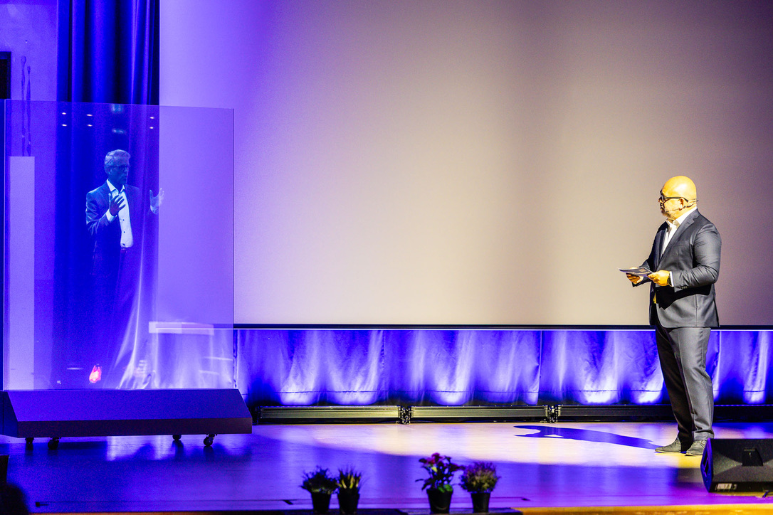 Danny on stage at a tech conference